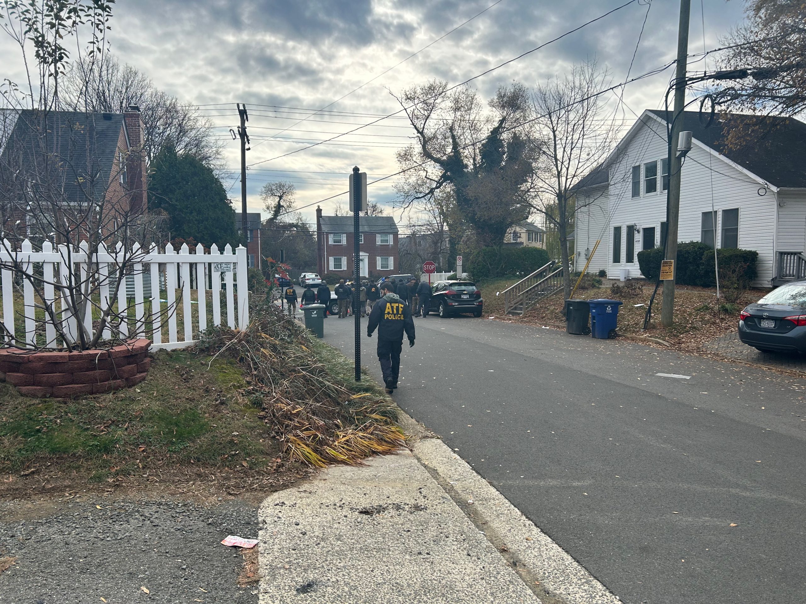 ATF and other agents survey the neighborhood